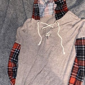 Long sleeve pullover, plaid sleeves and hood